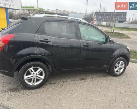 Черный Cанг Йонг Корандо, объемом двигателя 2 л и пробегом 168 тыс. км за 7900 $, фото 13 на Automoto.ua