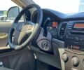 Чорний Cанг Йонг Korando, об'ємом двигуна 2 л та пробігом 208 тис. км за 7690 $, фото 26 на Automoto.ua