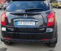 Чорний Cанг Йонг Korando, об'ємом двигуна 2 л та пробігом 216 тис. км за 7995 $, фото 4 на Automoto.ua