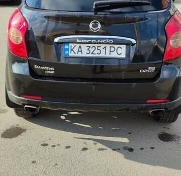Чорний Cанг Йонг Korando, об'ємом двигуна 2 л та пробігом 216 тис. км за 7995 $, фото 28 на Automoto.ua