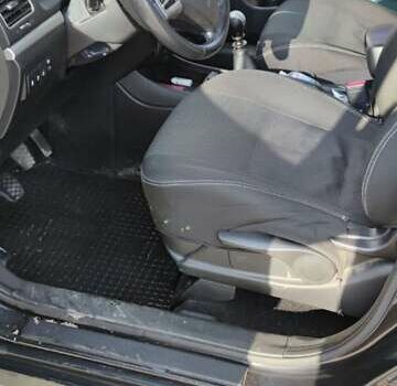 Чорний Cанг Йонг Korando, об'ємом двигуна 2 л та пробігом 216 тис. км за 7995 $, фото 17 на Automoto.ua