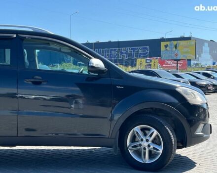 Чорний Cанг Йонг Korando, об'ємом двигуна 2 л та пробігом 208 тис. км за 7690 $, фото 11 на Automoto.ua
