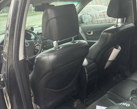 Черный Cанг Йонг Корандо, объемом двигателя 2 л и пробегом 168 тыс. км за 7900 $, фото 5 на Automoto.ua