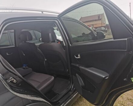 Черный Cанг Йонг Корандо, объемом двигателя 2 л и пробегом 350 тыс. км за 7000 $, фото 13 на Automoto.ua