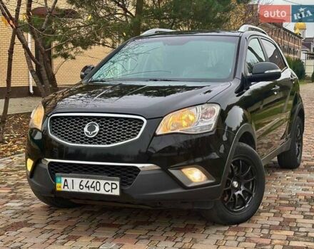 Черный Cанг Йонг Корандо, объемом двигателя 2 л и пробегом 168 тыс. км за 7200 $, фото 10 на Automoto.ua