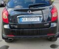 Чорний Cанг Йонг Korando, об'ємом двигуна 2 л та пробігом 216 тис. км за 7995 $, фото 5 на Automoto.ua