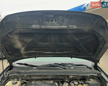 Черный Cанг Йонг Корандо, объемом двигателя 2 л и пробегом 168 тыс. км за 7200 $, фото 86 на Automoto.ua