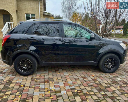 Черный Cанг Йонг Корандо, объемом двигателя 2 л и пробегом 168 тыс. км за 7200 $, фото 44 на Automoto.ua