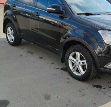 Чорний Cанг Йонг Korando, об'ємом двигуна 2 л та пробігом 216 тис. км за 7995 $, фото 35 на Automoto.ua