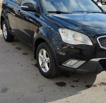 Чорний Cанг Йонг Korando, об'ємом двигуна 2 л та пробігом 216 тис. км за 7995 $, фото 16 на Automoto.ua