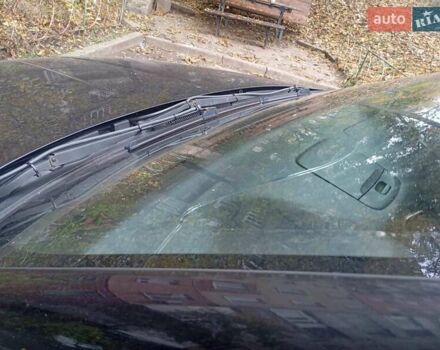 Черный Cанг Йонг Корандо, объемом двигателя 2 л и пробегом 176 тыс. км за 8500 $, фото 11 на Automoto.ua