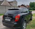 Черный Cанг Йонг Корандо, объемом двигателя 2 л и пробегом 57 тыс. км за 10500 $, фото 4 на Automoto.ua