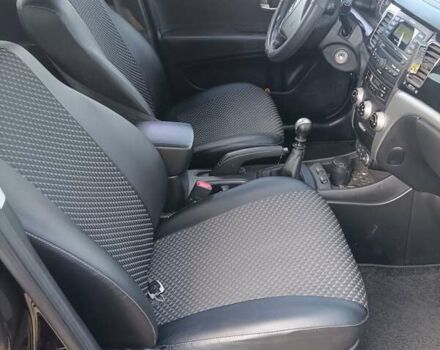 Чорний Cанг Йонг Korando, об'ємом двигуна 2 л та пробігом 74 тис. км за 8700 $, фото 1 на Automoto.ua