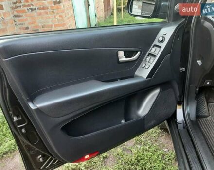 Черный Cанг Йонг Корандо, объемом двигателя 2 л и пробегом 149 тыс. км за 6999 $, фото 15 на Automoto.ua