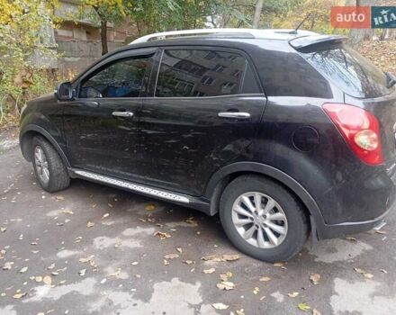 Черный Cанг Йонг Корандо, объемом двигателя 2 л и пробегом 176 тыс. км за 8500 $, фото 3 на Automoto.ua