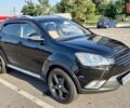 Черный Cанг Йонг Корандо, объемом двигателя 2 л и пробегом 171 тыс. км за 8200 $, фото 6 на Automoto.ua