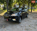 Чорний Cанг Йонг Korando, об'ємом двигуна 2 л та пробігом 144 тис. км за 8690 $, фото 1 на Automoto.ua