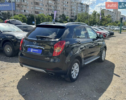 Черный Cанг Йонг Корандо, объемом двигателя 2 л и пробегом 169 тыс. км за 8900 $, фото 4 на Automoto.ua