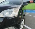Чорний Cанг Йонг Korando, об'ємом двигуна 2 л та пробігом 108 тис. км за 10500 $, фото 6 на Automoto.ua
