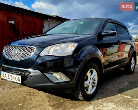 Черный Cанг Йонг Корандо, объемом двигателя 2 л и пробегом 100 тыс. км за 8300 $, фото 1 на Automoto.ua