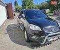 Черный Cанг Йонг Корандо, объемом двигателя 2 л и пробегом 180 тыс. км за 10000 $, фото 1 на Automoto.ua