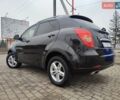 Чорний Cанг Йонг Korando, об'ємом двигуна 2 л та пробігом 126 тис. км за 6750 $, фото 6 на Automoto.ua