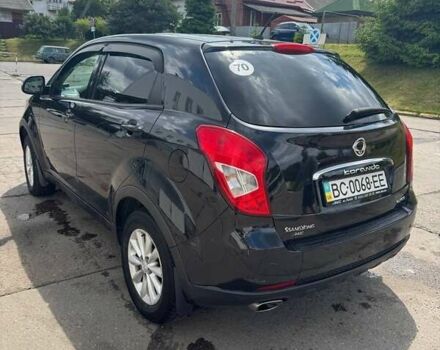 Чорний Cанг Йонг Korando, об'ємом двигуна 2 л та пробігом 89 тис. км за 10000 $, фото 5 на Automoto.ua