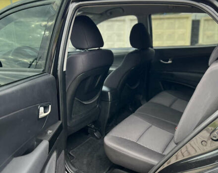 Чорний Cанг Йонг Korando, об'ємом двигуна 2 л та пробігом 180 тис. км за 8450 $, фото 12 на Automoto.ua