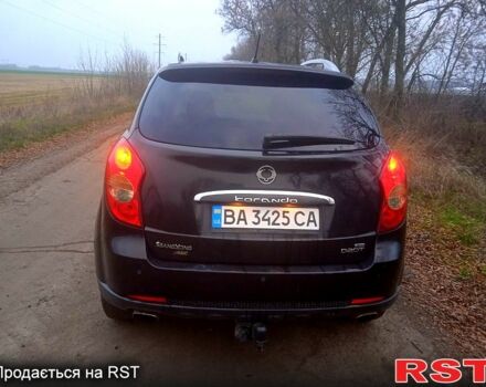 Черный Cанг Йонг Корандо, объемом двигателя 2 л и пробегом 316 тыс. км за 8800 $, фото 1 на Automoto.ua