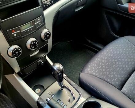 Черный Cанг Йонг Корандо, объемом двигателя 2 л и пробегом 100 тыс. км за 8300 $, фото 19 на Automoto.ua