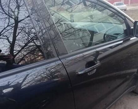 Чорний Cанг Йонг Korando, об'ємом двигуна 2 л та пробігом 52 тис. км за 12600 $, фото 2 на Automoto.ua