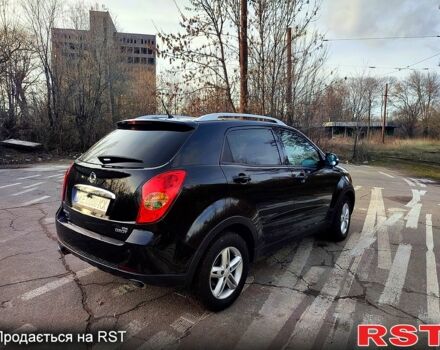 Чорний Cанг Йонг Korando, об'ємом двигуна 2 л та пробігом 130 тис. км за 11500 $, фото 10 на Automoto.ua