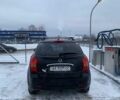 Чорний Cанг Йонг Korando, об'ємом двигуна 2 л та пробігом 178 тис. км за 10500 $, фото 3 на Automoto.ua