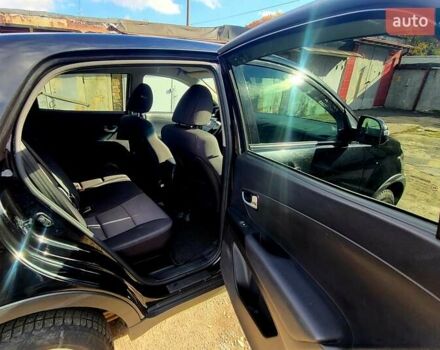 Черный Cанг Йонг Корандо, объемом двигателя 2 л и пробегом 100 тыс. км за 8300 $, фото 12 на Automoto.ua