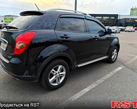 Черный Cанг Йонг Корандо, объемом двигателя 2 л и пробегом 187 тыс. км за 8700 $, фото 4 на Automoto.ua