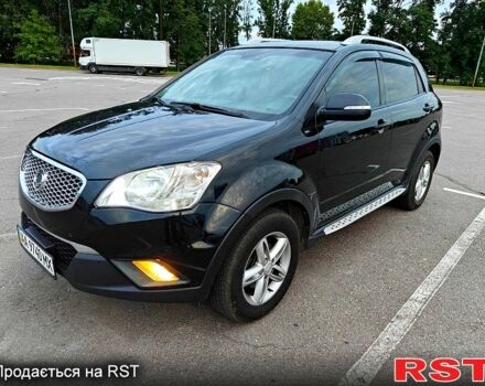 Черный Cанг Йонг Корандо, объемом двигателя 2 л и пробегом 187 тыс. км за 8700 $, фото 1 на Automoto.ua