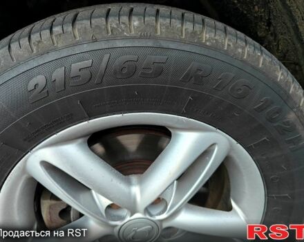 Черный Cанг Йонг Корандо, объемом двигателя 2 л и пробегом 187 тыс. км за 8700 $, фото 12 на Automoto.ua