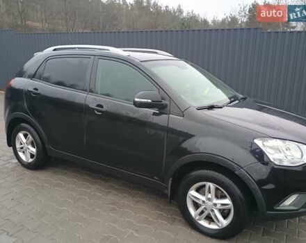 Черный Cанг Йонг Корандо, объемом двигателя 2 л и пробегом 165 тыс. км за 8200 $, фото 11 на Automoto.ua