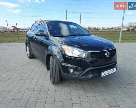 Черный Cанг Йонг Корандо, объемом двигателя 2 л и пробегом 163 тыс. км за 10599 $, фото 11 на Automoto.ua