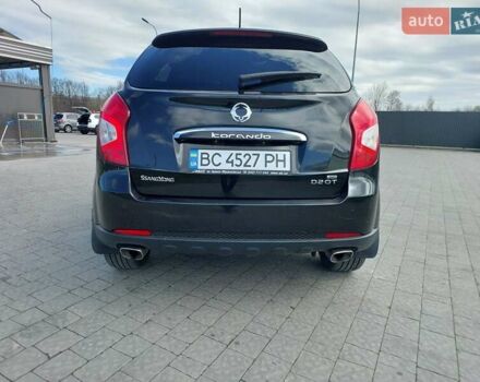 Черный Cанг Йонг Корандо, объемом двигателя 2 л и пробегом 163 тыс. км за 10599 $, фото 6 на Automoto.ua