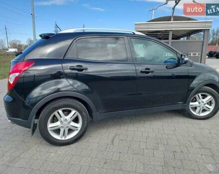 Черный Cанг Йонг Корандо, объемом двигателя 2 л и пробегом 163 тыс. км за 10599 $, фото 4 на Automoto.ua