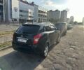 Черный Cанг Йонг Корандо, объемом двигателя 2 л и пробегом 164 тыс. км за 10500 $, фото 2 на Automoto.ua