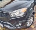 Черный Cанг Йонг Корандо, объемом двигателя 2 л и пробегом 170 тыс. км за 10400 $, фото 1 на Automoto.ua