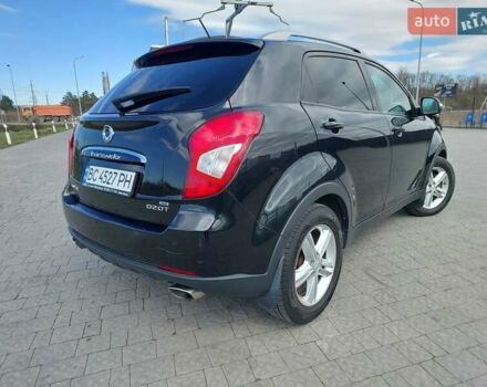 Черный Cанг Йонг Корандо, объемом двигателя 2 л и пробегом 163 тыс. км за 10599 $, фото 5 на Automoto.ua