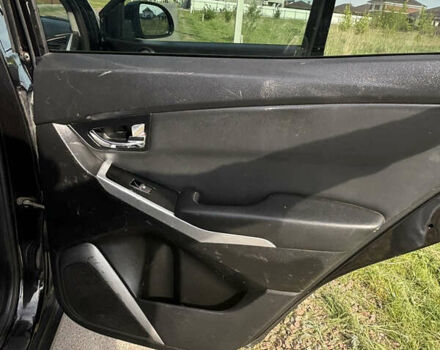 Чорний Cанг Йонг Korando, об'ємом двигуна 2 л та пробігом 229 тис. км за 8199 $, фото 19 на Automoto.ua