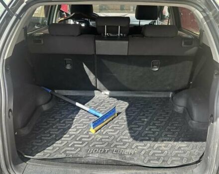 Чорний Cанг Йонг Korando, об'ємом двигуна 2 л та пробігом 171 тис. км за 8800 $, фото 10 на Automoto.ua