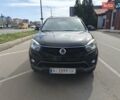 Черный Cанг Йонг Корандо, объемом двигателя 2 л и пробегом 240 тыс. км за 10000 $, фото 2 на Automoto.ua