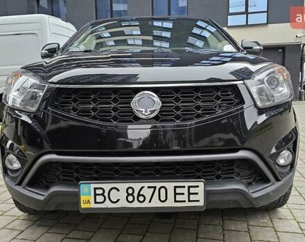 Черный Cанг Йонг Корандо, объемом двигателя 2 л и пробегом 173 тыс. км за 9000 $, фото 2 на Automoto.ua