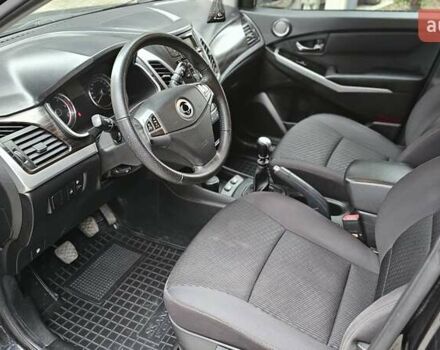 Черный Cанг Йонг Корандо, объемом двигателя 2 л и пробегом 173 тыс. км за 9000 $, фото 11 на Automoto.ua