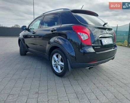 Черный Cанг Йонг Корандо, объемом двигателя 2 л и пробегом 163 тыс. км за 10599 $, фото 7 на Automoto.ua